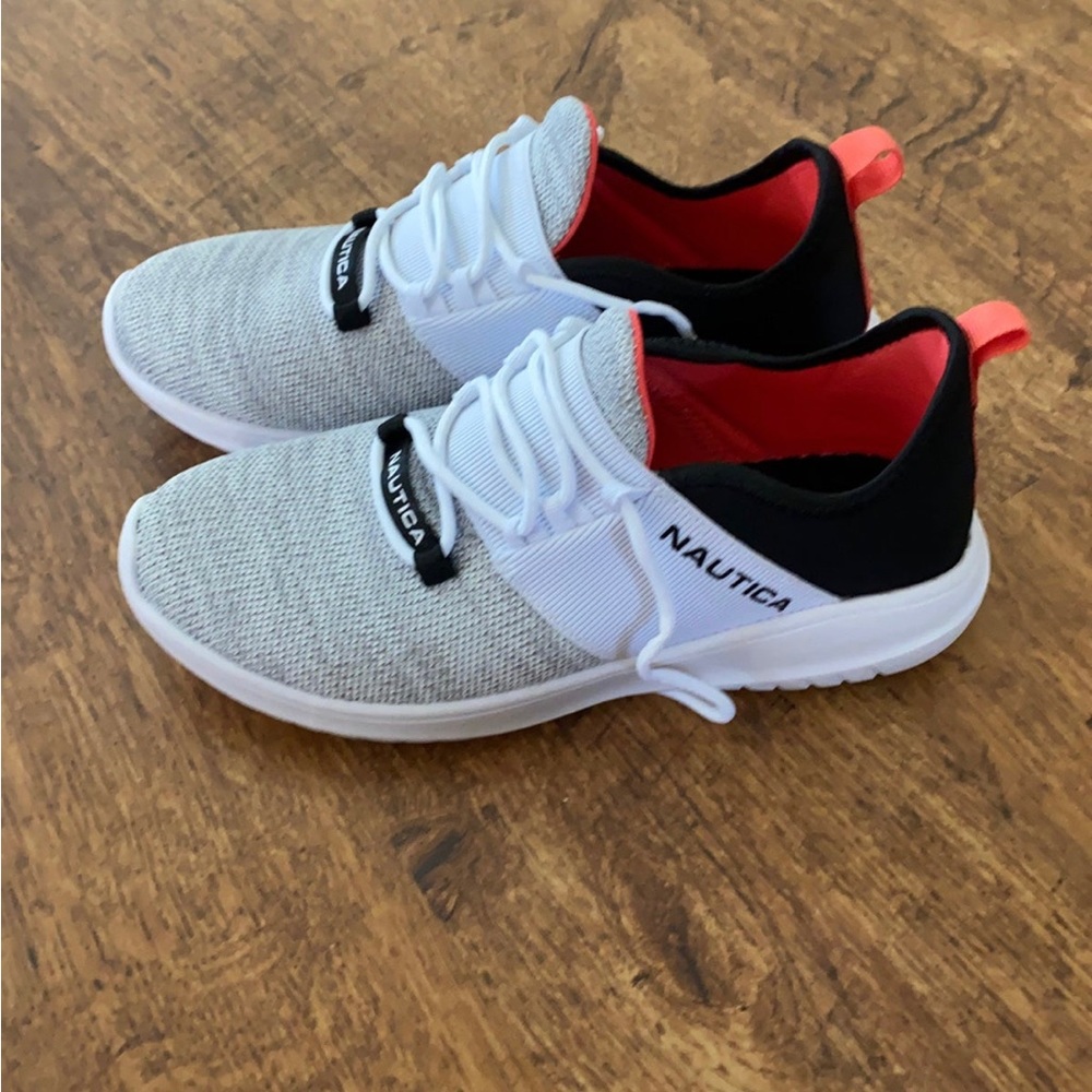 Brand new never worn but the tags were torn off. Nautica women’s tennis shoes.